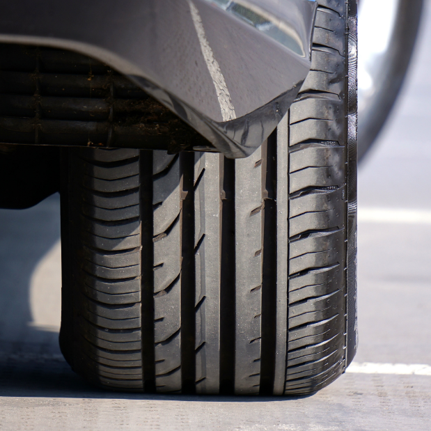 Close up of a car tire
Description automatically generated